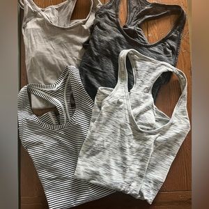 Lululemon Tanks: 3 Essential Tanks and 1 Cool Racerback size 4